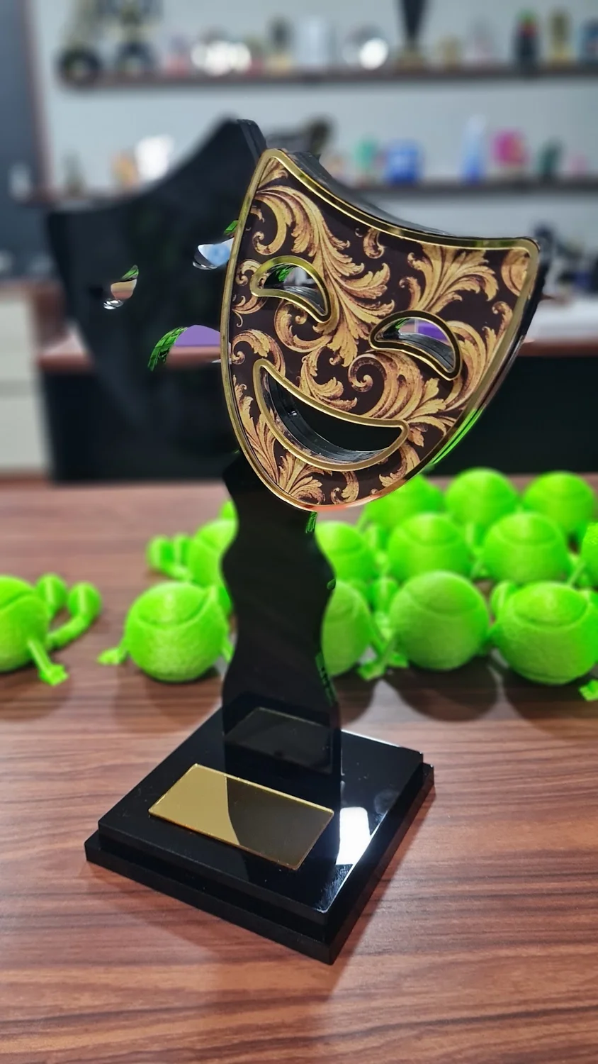Troféu em formato de máscaras de teatro